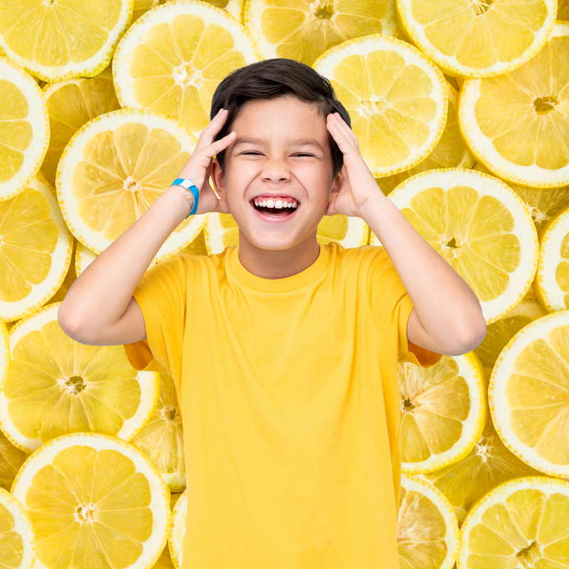 little boy laughing at Lemon Puns