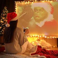 Lady watching Grinch Movie